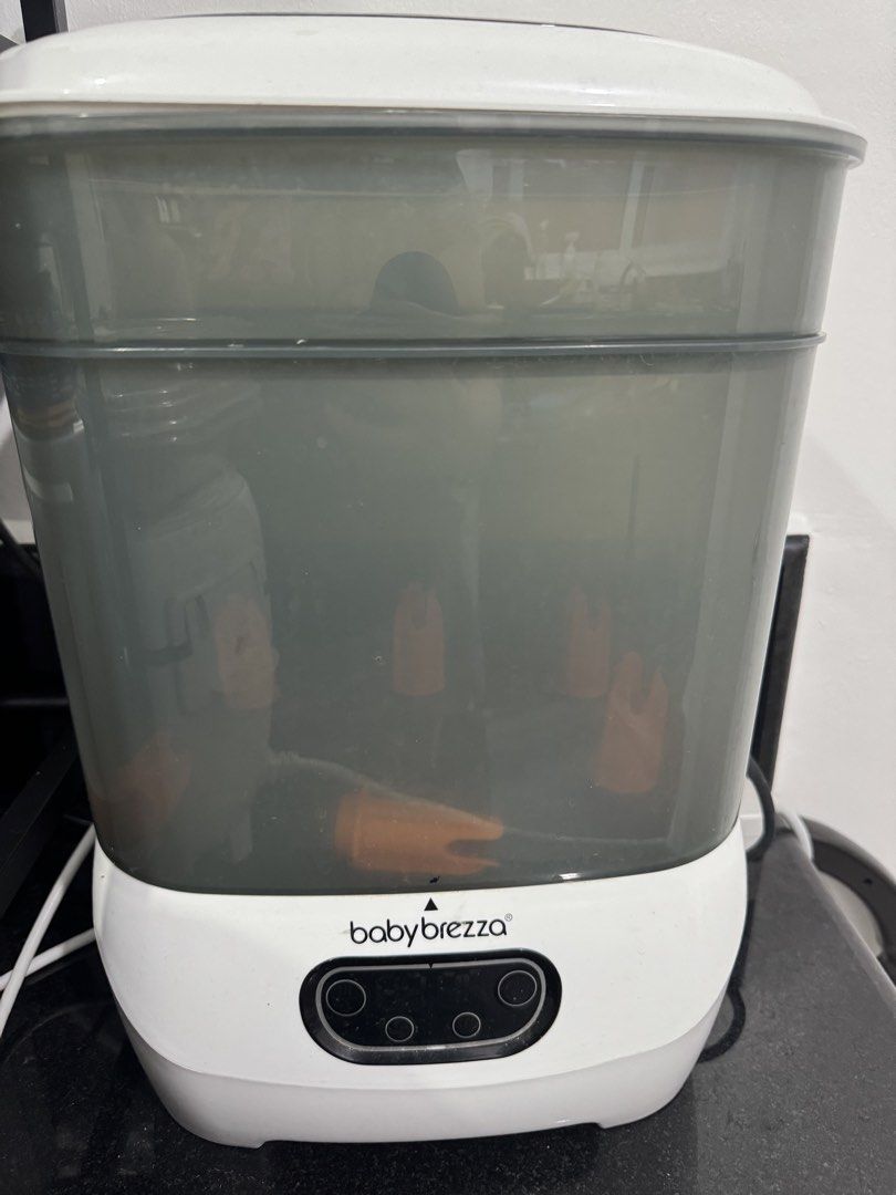 Baby Brezza sterilizer and dryer (Category: Breastfeeding & Bottle Feeding) located in Manila. Submitted by narziesc (Listing ID 1465383066, Image 1). Description: Well-used for a year but still very much functional. Regularly descaled.