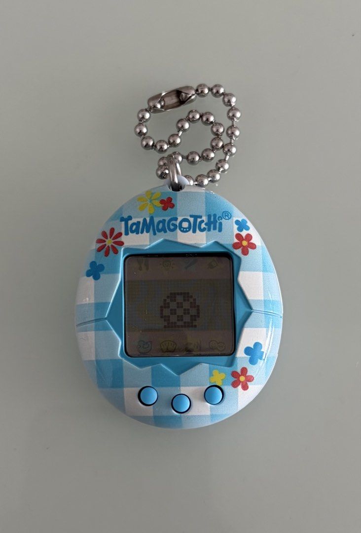 BANDAI | Tamagotchi ~ Gen 2 (Category: Interactive Toys) located in Makati City. Submitted by cardlab (Listing ID 1465573019, Image 2). Description: Items are 💯 authentic/original/legit. About The Item: • Color: Light Blue • Series: Gen 2 • Played Twice • With box and manual • Newly replaced battery • +4 bnew batteries • Actual pics/ photos Packaging (If Shipping): ✔️ Cardboard (If available) ✔️ Bubble wrap NOTE: • No Payment = No Reservation (I