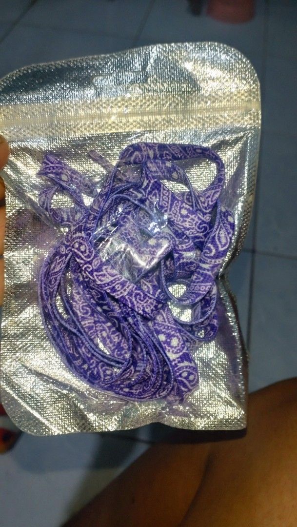 Bandana Shoelace pair (Category: Sneakers) located in Valenzuela. Submitted by diane.35 (Listing ID 1465493381, Image 2). Description: - Trendy purple flat shoelaces with a white paisley bandana design - Standard flat sneaker lace width fits most shoes - Comes in a reusable silver foil zip pouch - Great way to upgrade and customize your old sneakers - Brand new and ready to ship!.