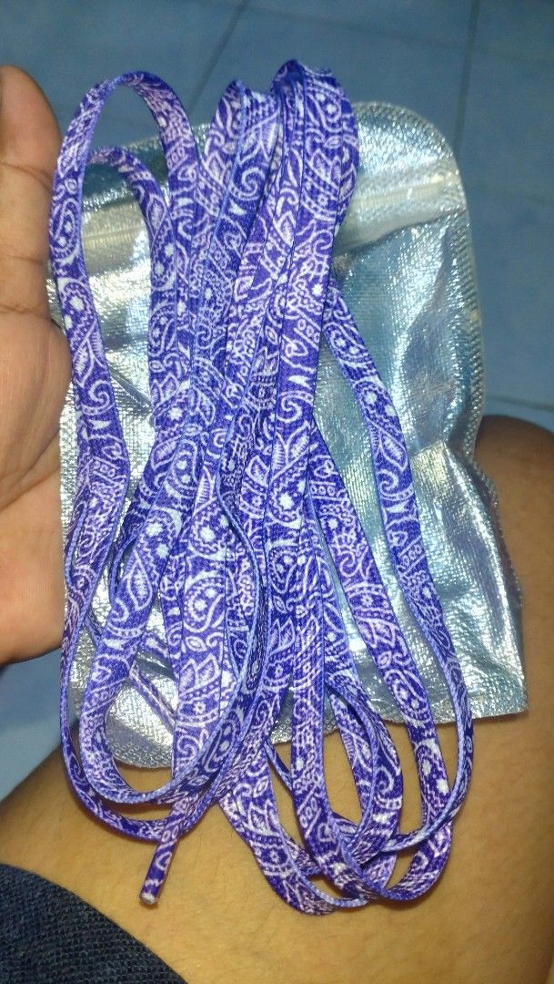 Bandana Shoelace pair (Category: Sneakers) located in Valenzuela. Submitted by diane.35 (Listing ID 1465493381, Image 1). Description: - Trendy purple flat shoelaces with a white paisley bandana design - Standard flat sneaker lace width fits most shoes - Comes in a reusable silver foil zip pouch - Great way to upgrade and customize your old sneakers - Brand new and ready to ship!.