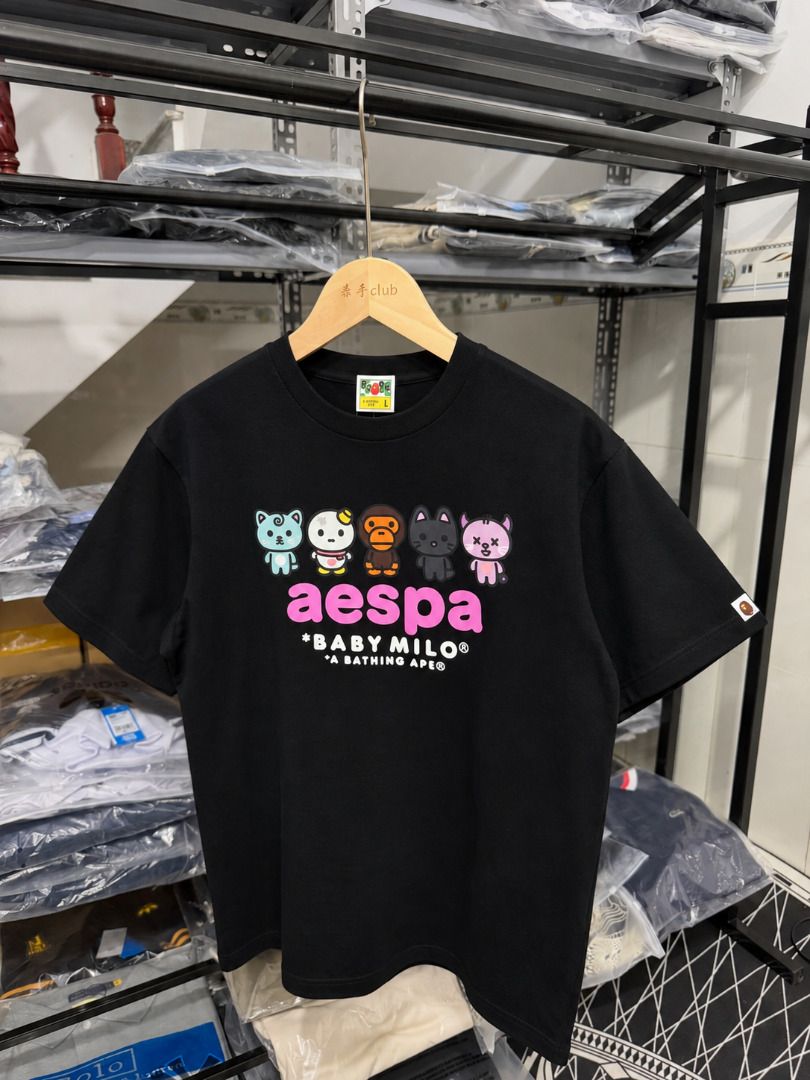 Bape Aespa Tshirt (Category: Shirts) located in San Fernando. Submitted by fynder (Listing ID 1465498668, Image 1). Description: Bape Aespa complete tags and ziplock Limited Sizes : S - XL 📦 Fast processing (Air cargo freight) 💬 More drops daily on IG: @fynder1 🔒 Buyer protection through Carousell — shop with confidence .