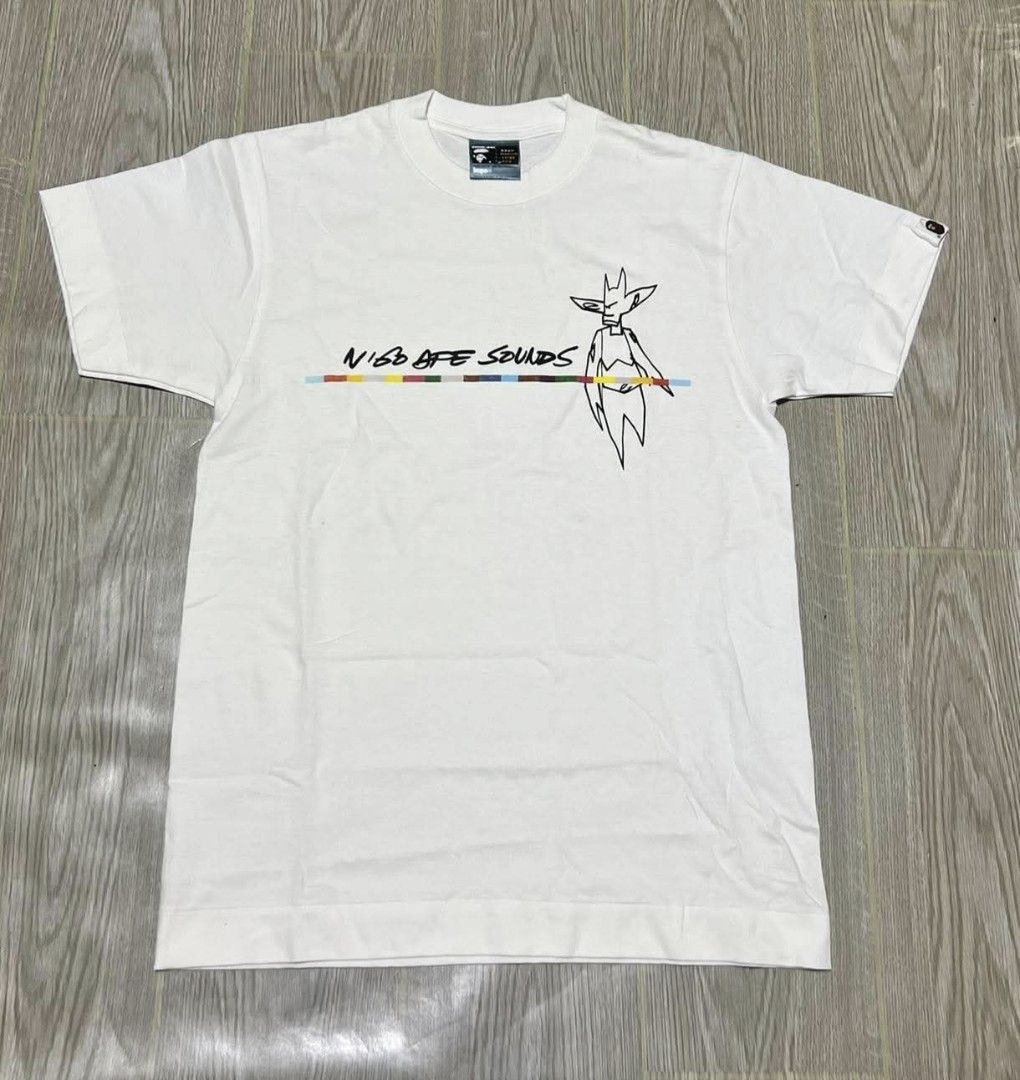 BAPE NIGO Ape Sounds Graphic Tee White (Category: Tshirts & Polo Shirts ) located in Puerto Princesa. Submitted by jaymark.1992 (Listing ID 1465490561, Image 1). Description: - Brand: BAPE (Ape Sounds Collection by NIGO) - Color: White with black and colorful stripe graphic Bape A Bathing Ape Limited Edition Collaboration x Futura Unkle Vintage T-shirt SMALL ON TAG W18"X L26 EXCELENT TO NEAR LIKE NEW CONDITION COLOR RATE:9.8/10 NEED WASH PALAWAN 