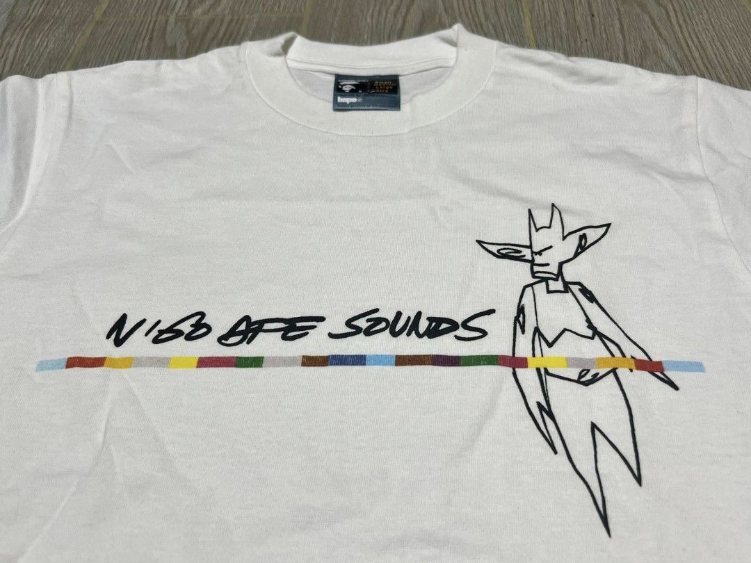 BAPE NIGO Ape Sounds Graphic Tee White (Category: Tshirts & Polo Shirts ) located in Puerto Princesa. Submitted by jaymark.1992 (Listing ID 1465490561, Image 2). Description: - Brand: BAPE (Ape Sounds Collection by NIGO) - Color: White with black and colorful stripe graphic Bape A Bathing Ape Limited Edition Collaboration x Futura Unkle Vintage T-shirt SMALL ON TAG W18"X L26 EXCELENT TO NEAR LIKE NEW CONDITION COLOR RATE:9.8/10 NEED WASH PALAWAN 