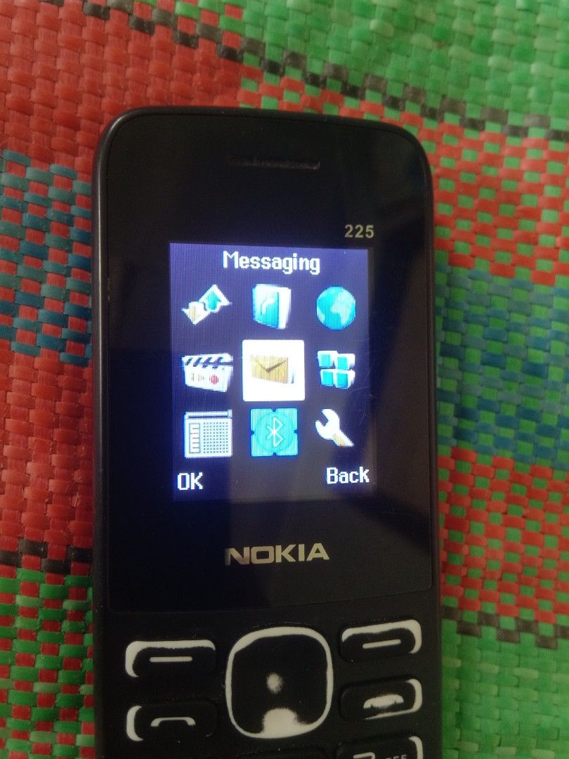 Basic Dual Sim Phone with a Memory Card Slot (Category: Early Generation Mobile Phones) located in Rizal. Submitted by mnmarquez2 (Listing ID 1465540817, Image 1). Description: - can call and can text - can receive calls and text messages - has a memory card slot - with a dual sim feature - has torch - has a camera - can record and can watch videos - has a built-in music player - has bluetooth - has a built-in radio - can connect to the internet 