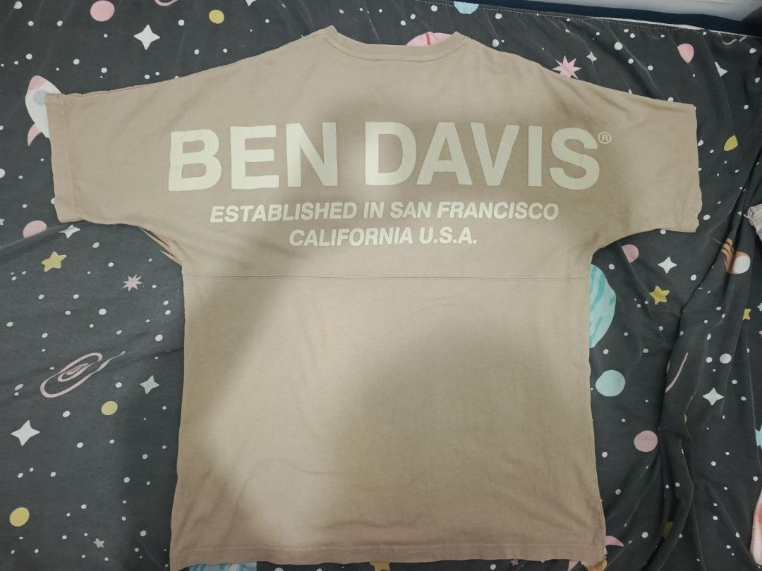Ben Davis Tan Logo T-Shirt Size L (Category: Tshirts & Polo Shirts ) located in Caloocan City. Submitted by iandoom09 (Listing ID 1465498713, Image 2). Description: - Brand: Ben Davis - Color: Tan - Size: Large (100% Cotton) - Design: Small chest logo & large back print - Details: Classic crew neck, short sleeves, and iconic woven monkey patch near hem - Condition: Excellent / Pre-loved (manage expectations).