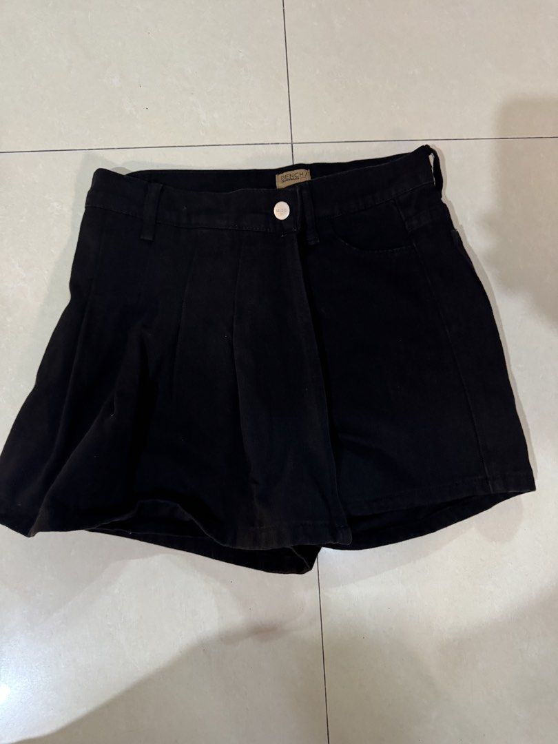 Bench Black Denim Skort Size M (Category: Skirts) located in Quezon City. Submitted by sweetlyluxe (Listing ID 1465486807, Image 1). Description: - Brand: Bench - Size: Medium - Color/Wash: Clean black denim - Style: Skort (wrap front skirt look with built-in shorts) - Closure: Silver front button with zipper - Pockets: Two functional back pockets - Condition: Excellent.