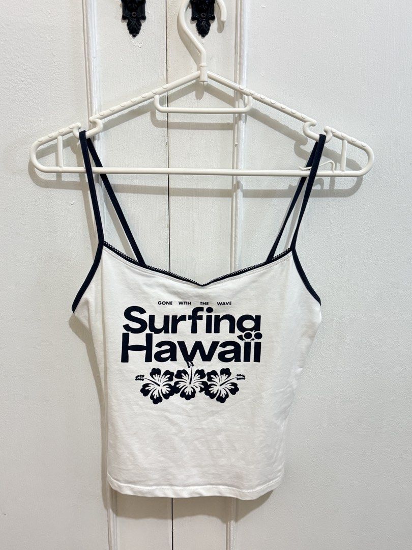 Bershka Tank Top (Category: Sleeveless) located in Quezon City. Submitted by jsellingmythings (Listing ID 1465392968, Image 1). Description: Size: Medium but perfect on small RFS: Not my style anymore Flaws: Only if you have big 🍒, the text stretches out a bit .