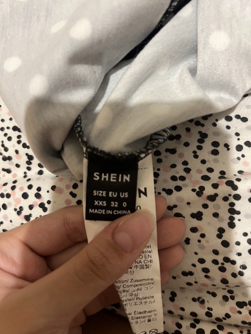 Black and White Polka Dot Halter Top (Category: Sleeveless) located in Makati City. Submitted by nat____ (Listing ID 1465487797, Image 3). Description: - Fit: Cropped style, size XXS (fits EU 32, US 0) - Only worn once - rfs: not my style .