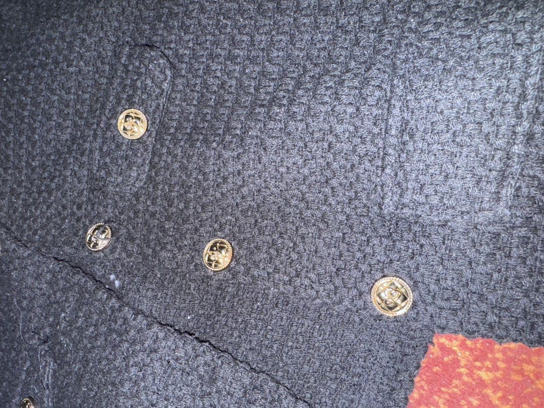 Black Knit Tweed Jacket with Gold Buttons (Category: Coats, Jackets and Outerwear) located in Pasig City. Submitted by rowie_08 (Listing ID 1465514562, Image 2). Description: - Color & Material: Classic black textured knit tweed fabric - Fit & Style: Structured fit with long sleeves, great for layering - Details: Multiple front patch pockets and chic decorative gold-tone metal buttons - Closure: Convenient front button closure - Versatility: Perf