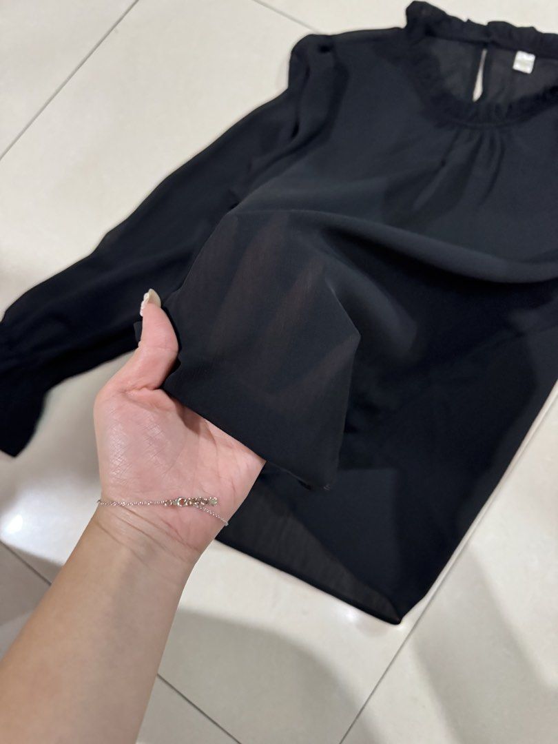 Black Long Sleeve Chiffon Blouse Ruffle Collar (Category: Blouses) located in Quezon City. Submitted by sweetlyluxe (Listing ID 1465489646, Image 2). Description: - Color: Black - Size: Small - Material: Lightweight sheer chiffon - Details: Pleated ruffle collar and back keyhole button closure - Styling: Versatile for both work and casual outings.