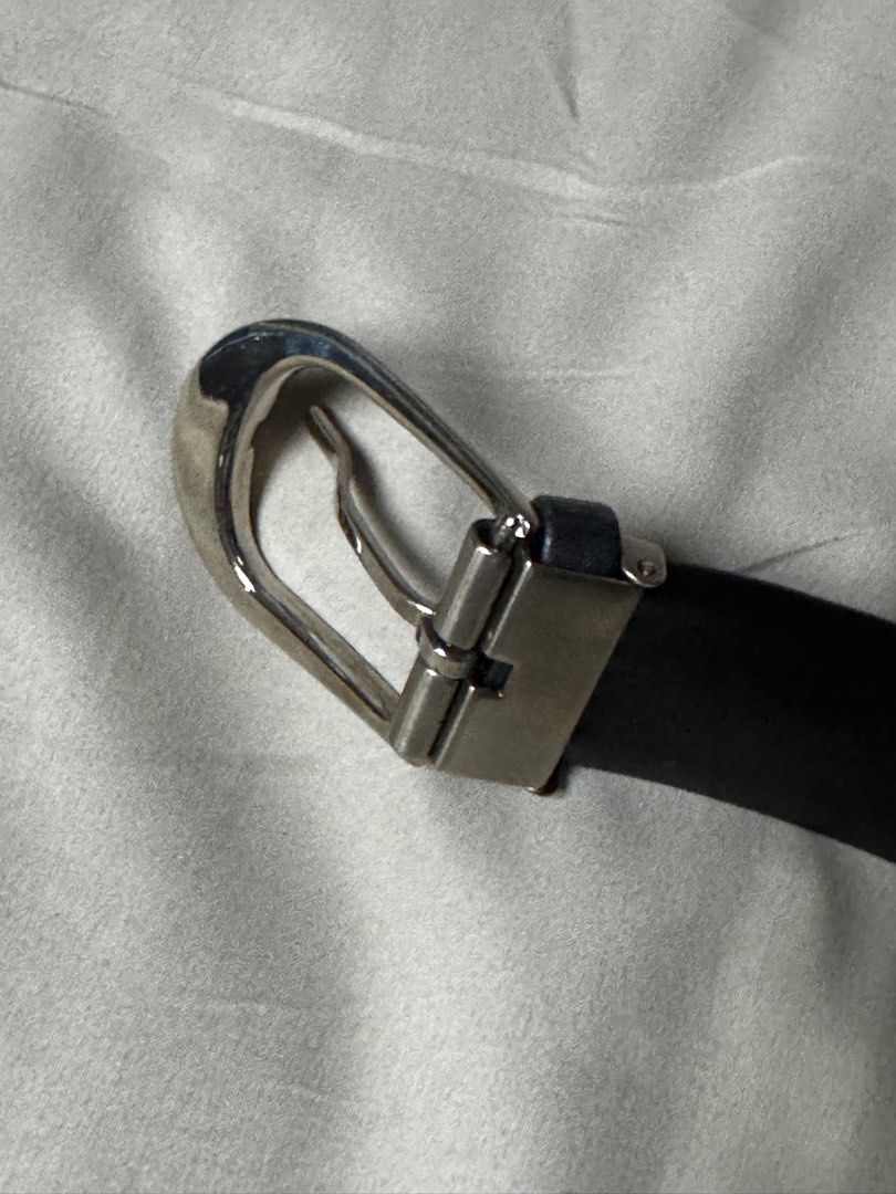 Dunhill Black patterned leather belt with silver buckle (Category: Belts) located in Manila. Submitted by seangoart (Listing ID 1465527160, Image 3). Description: - Color: Black - Material: Genuine leather - Design: Embossed geometric maze pattern throughout - Hardware: Silver-toned metal prong buckle and matching loop - Fit: Standard center-punched hole adjustments - Styling: Versatile accessory for trousers or jeans - Condition: Ready for daily