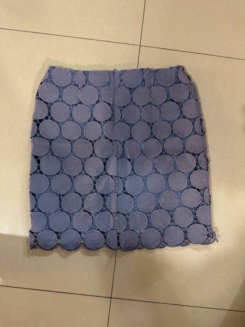 Blue Lace Circle Pattern Mini Skirt (Category: Skirts) located in Quezon City. Submitted by sweetlyluxe (Listing ID 1465494477, Image 2). Description: - Color: Periwinkle blue - Design: Geometric circle cut-out lace pattern with a chic scalloped hem - Fit: Structured fit with waist darting and a convenient back zipper closure - Details: Fully lined underneath the open lace design - Style: Versatile piece, easy to dress up or down for any occasion