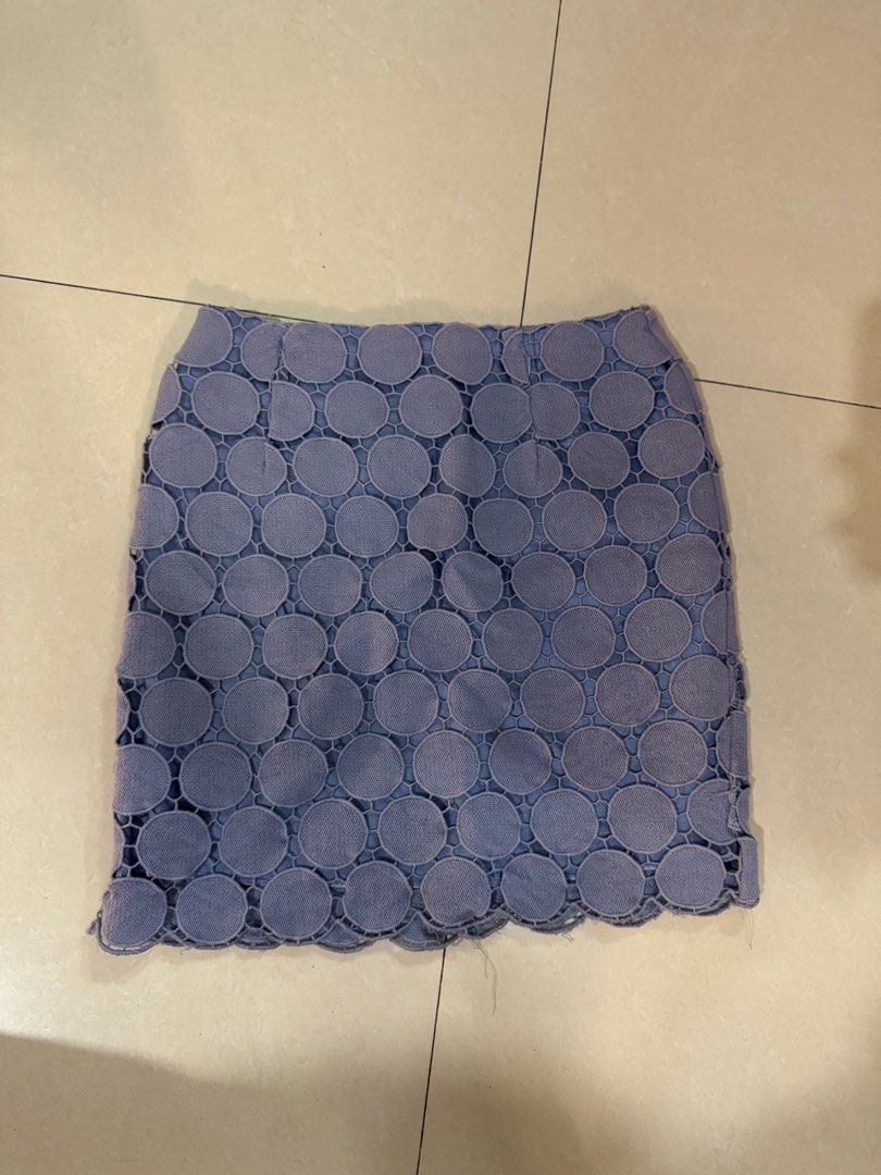 Blue Lace Circle Pattern Mini Skirt (Category: Skirts) located in Quezon City. Submitted by sweetlyluxe (Listing ID 1465494477, Image 1). Description: - Color: Periwinkle blue - Design: Geometric circle cut-out lace pattern with a chic scalloped hem - Fit: Structured fit with waist darting and a convenient back zipper closure - Details: Fully lined underneath the open lace design - Style: Versatile piece, easy to dress up or down for any occasion