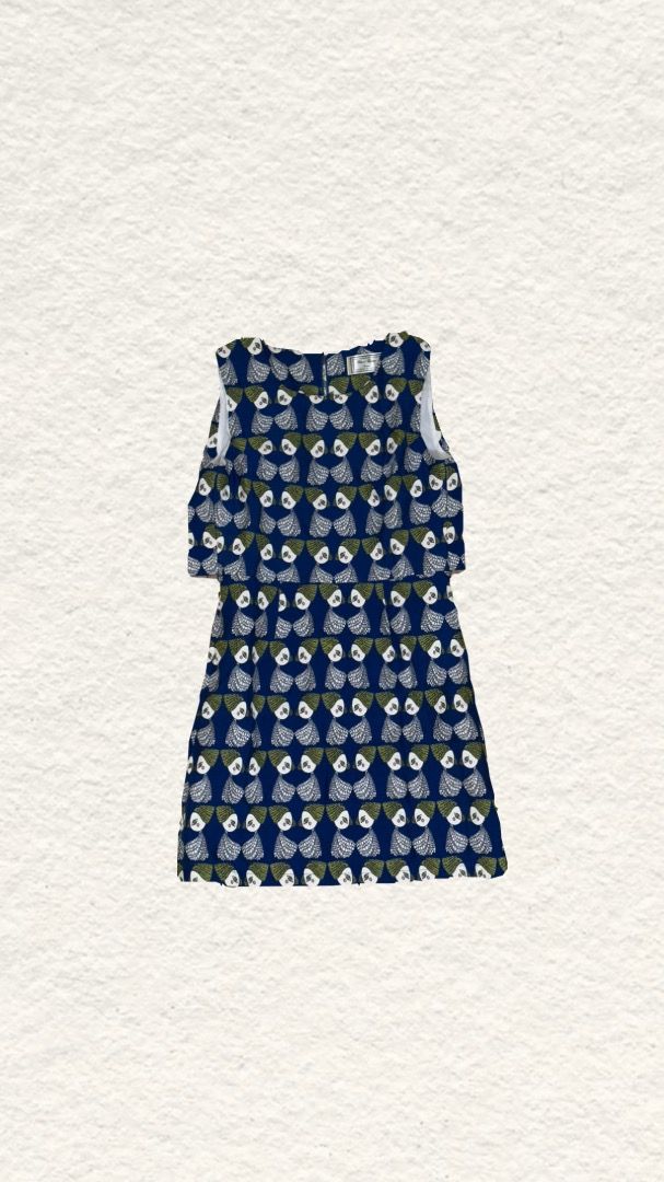 Blue printed sleeveless mini dress with quirky pattern (Category: Dresses) located in Quezon City. Submitted by zealhorse_a9f3c3 (Listing ID 1465549370, Image 1). Description: - Color: Navy blue with playful geometric print - Fit: Fitted bodice, defined waist, and flared skirt - Closure: Back neck zipper - Fabric: Lightweight and comfortable with clean armhole lining - Condition: Excellent, ready to wear.