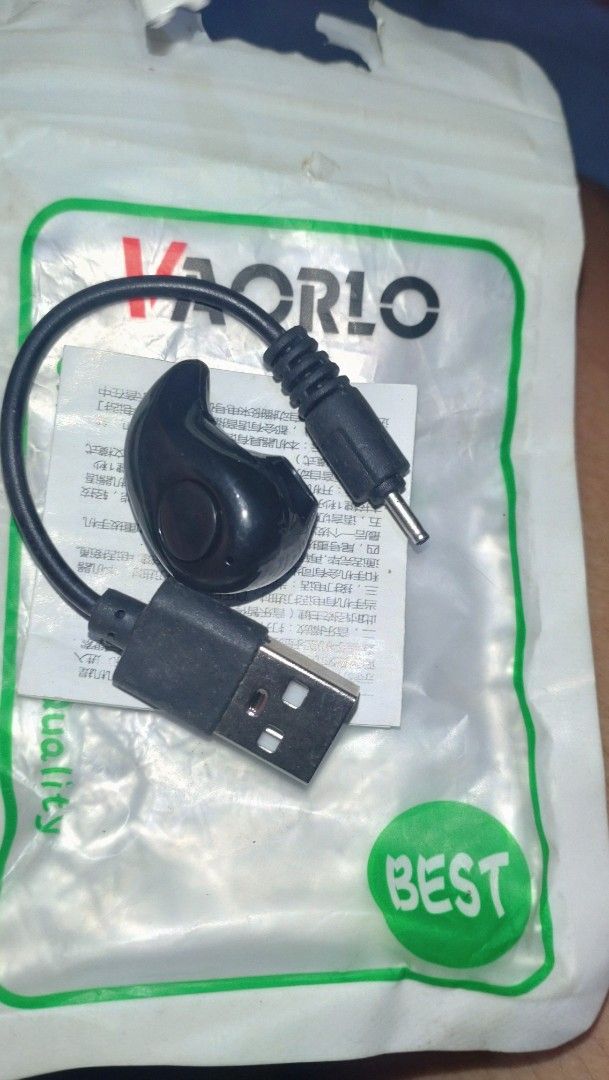 Bluetooth Earphone and Shoe strap set (Category: Earphones) located in Valenzuela. Submitted by diane.35 (Listing ID 1465486188, Image 1). Description: - Color: Black mini single wireless earphone - Includes: USB charging cable with pin connector and a white pouch with green/red accents - Bonus item: Black adjustable shoe strap with durable metal hooks - Condition: Brand new and ready to use - Perfect bundle of useful small items at a great price
