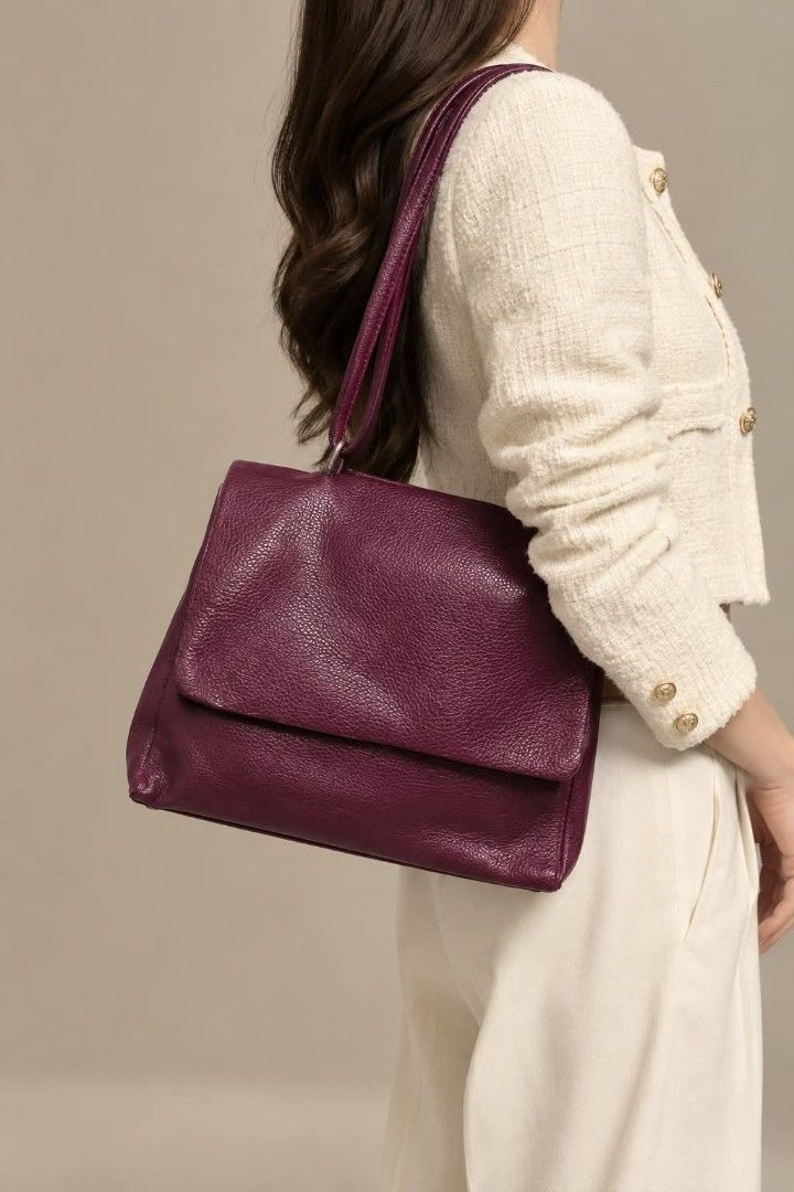 Borse in Pelle Pebbled Leather Shoulder Bag (Category: Tote Bags) located in Baguio. Submitted by luxuryvaultbagsandfashion (Listing ID 1465530349, Image 1). Description: Borse in Pelle Pebbled Leather Shoulder Bag Classic Italian Craftmanship Add a rich pop of color to your wardrobe with this stunning burgundy leather shoulder bag. Crafted in Italy from premium pebbled leather with a structured flap-top design and classic hardware, it combines t