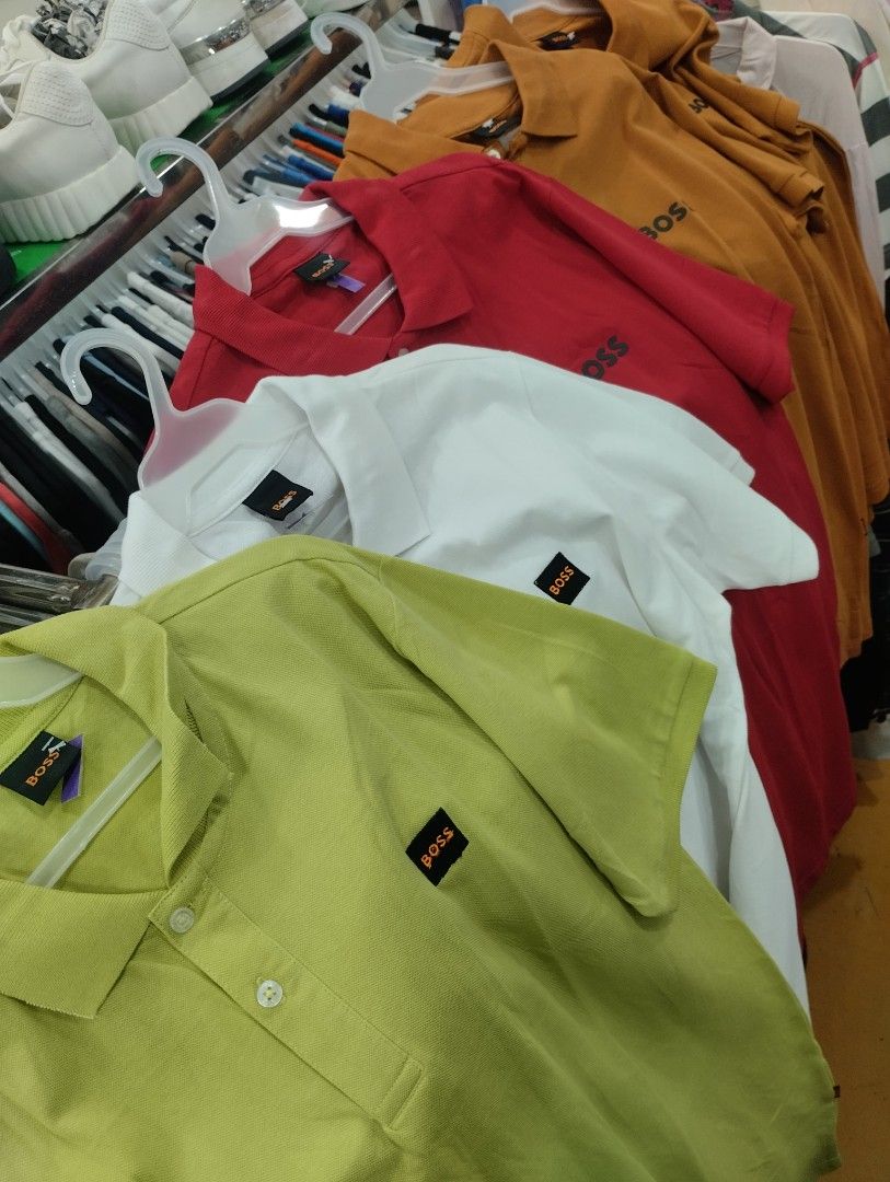 BOSS Polo Shirt Multiple Colors Available (Category: Tshirts & Polo Shirts ) located in Manila. Submitted by niggzreyno51476 (Listing ID 1465448773, Image 1). Description: - Brand: BOSS - Item: Classic Polo Shirt - Available Colors: Lime green, white, red, mustard yellow - Design: Collared with front button placket and small chest logo patch - Material: Comfortable cotton blend - Fit/Use: Great for casual daily wear - Note: Choose your preferred 