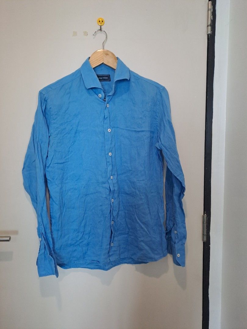 Bottega italia 100% linen (Category: Longsleeves) located in Manila. Submitted by joanbalde39643 (Listing ID 1465438673, Image 1). Description: This vibrant cornflower blue linen longsleeves features an elegant, wide French spread collar and a lightweight woven texture perfect for warm-weather styling. The inner collar is stitched with a premium fabric brand label reading "Bottega Italiana.".