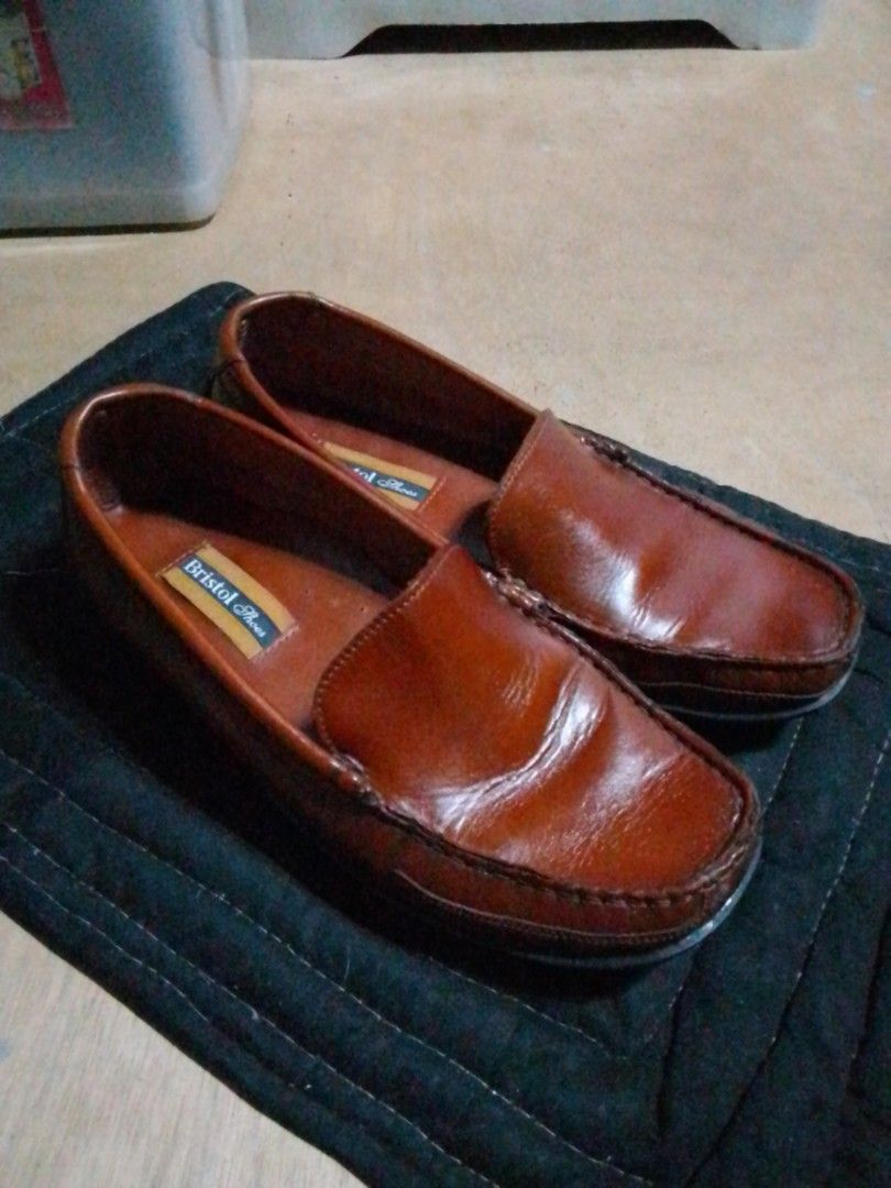 Bristol Driving Loafers Shoes (Category: Dress Shoes) located in Navotas City. Submitted by _ryujin (Listing ID 1465525942, Image 2). Description: SIZES Euro: 44 Cm: 28 Size: 10 No issue excellent condition only used once - Brand: Bristol Shoes - Style: Slip-on moccasin loafers - Color: Brown - Material: Genuine leather upper with textured rubber sole - Details: Contrast stitching along toe box, cushioned insole with logo tag - Condition: Clean u