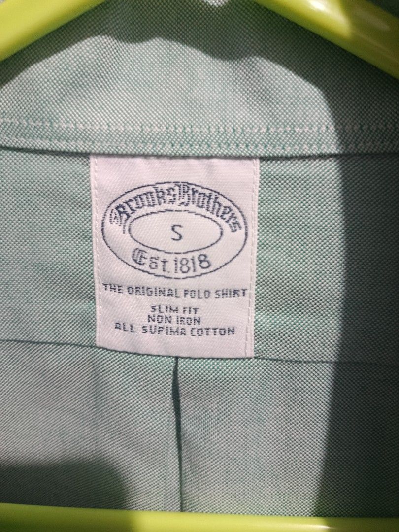 Brooks brothers button down shirt (Category: Tshirts & Polo Shirts ) located in Jaen. Submitted by vinzyrus217291 (Listing ID 1465442692, Image 1). Description: green brooks brothers button down shirt as new condition no issues 10/10 color rate Nueva ecija location 📍 can do meetups or shipping via jnt unli VC and past transaction checking for assurance.