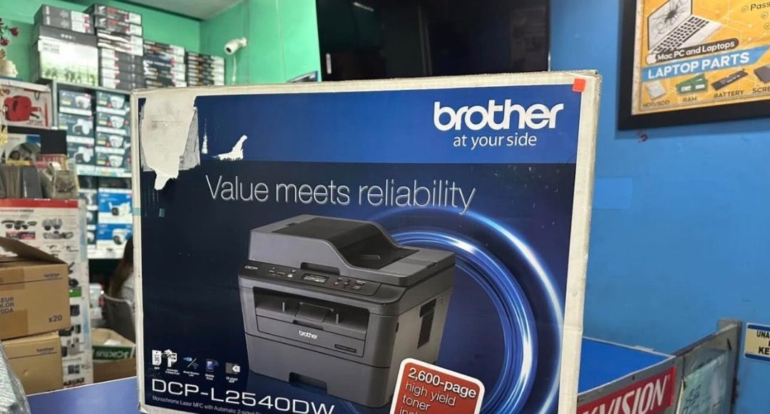 Brother DCP-L2540DW Laser Printer (Category: Printers, Scanners & Copiers) located in Lubao. Submitted by silentturtle_5f8fa7 (Listing ID 1465560705, Image 1). Description: - Model: Brother DCP-L2540DW Monochrome Laser Multi-Function Printer - Condition: Brand new, unopened box - Key Features: Wireless capability and automatic 2-sided printing - Toner: Includes 2,600-page high-yield toner inside - Ideal For: Home office or small business setups -