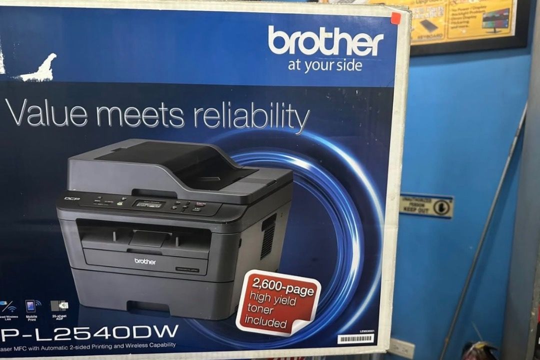 Brother DCP-L2540DW Laser Printer (Category: Printers, Scanners & Copiers) located in Lubao. Submitted by silentturtle_5f8fa7 (Listing ID 1465560705, Image 2). Description: - Model: Brother DCP-L2540DW Monochrome Laser Multi-Function Printer - Condition: Brand new, unopened box - Key Features: Wireless capability and automatic 2-sided printing - Toner: Includes 2,600-page high-yield toner inside - Ideal For: Home office or small business setups -