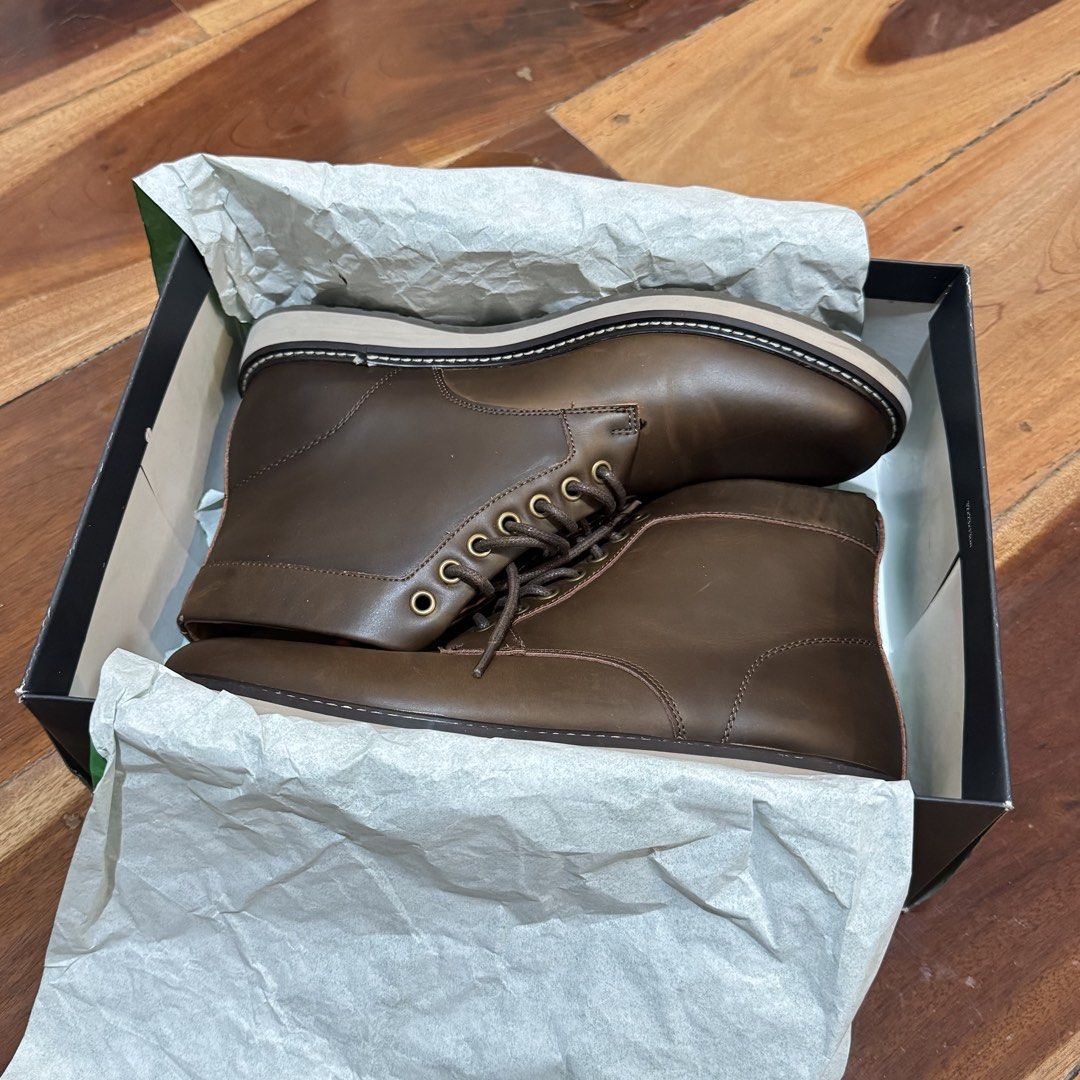 Brown Leather Boots (Category: Boots) located in Quezon City. Submitted by yannahmaldia (Listing ID 1465453449, Image 2). Description: - Brand: Tommy Hilfiger - Color: Dark Brown - Size: US 9 - Material: Genuine Leather - flaking and cracking on the inner lining - Inclusions: Original box included - barely used but shoes are in storage thats why the leather is cracking.