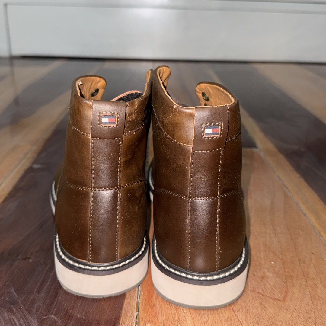 Brown Leather Boots (Category: Boots) located in Quezon City. Submitted by yannahmaldia (Listing ID 1465453449, Image 3). Description: - Brand: Tommy Hilfiger - Color: Dark Brown - Size: US 9 - Material: Genuine Leather - flaking and cracking on the inner lining - Inclusions: Original box included - barely used but shoes are in storage thats why the leather is cracking.