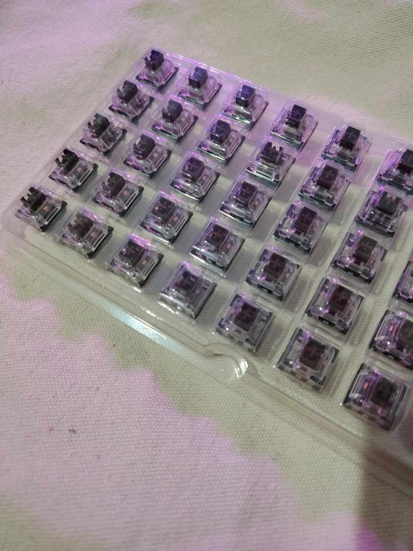 Brown Switch Mechanical Keyboard (Category: Computer Keyboard) located in Mandaluyong City. Submitted by declutter_kween (Listing ID 1465525506, Image 3). Description: - Type: Mechanical keyboard switches with tactile brown stems - Housing: Clear housing for RGB flow - Condition: Pins are straight and ready for PCB mounting - Inclusion: Comes with a plastic tray for easy organization - Perfect for custom keyboard builds or replacements - Ccame wi