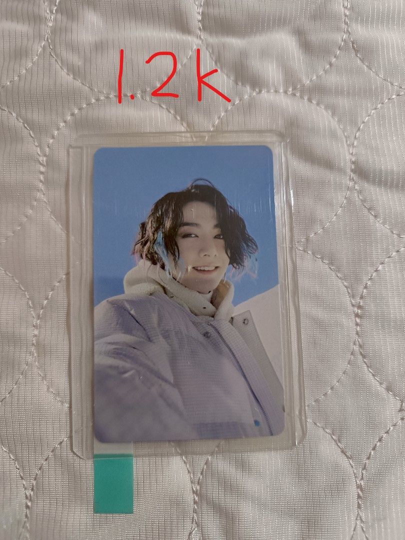 BTS Jungkook Photocard Collection Various Versions (Category: K-Wave Merchandise) located in Cabuyao City. Submitted by lourge.ig (Listing ID 1465449504, Image 2). Description: - Official BTS Jungkook photocards - 5 different versions from various eras and concepts - Condition: Mint, clean front and back with no bends or creases - Storage: Kept inside top loaders for extra protection - Purchase options: Available individually or as a set - Send a