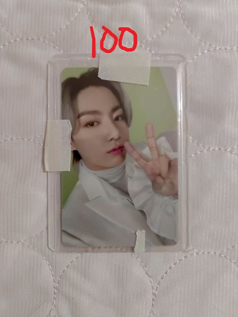 BTS Jungkook Photocard Collection Various Versions (Category: K-Wave Merchandise) located in Cabuyao City. Submitted by lourge.ig (Listing ID 1465449504, Image 3). Description: - Official BTS Jungkook photocards - 5 different versions from various eras and concepts - Condition: Mint, clean front and back with no bends or creases - Storage: Kept inside top loaders for extra protection - Purchase options: Available individually or as a set - Send a