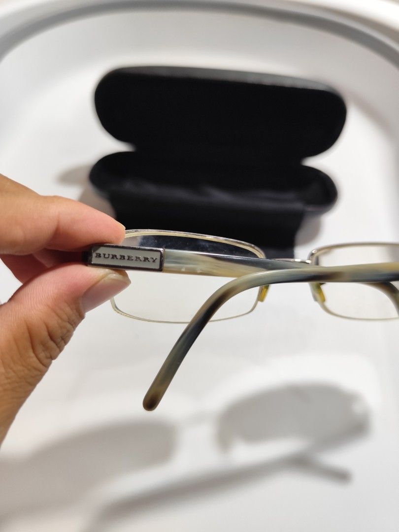 Burberry Frame (Category: Sunglasses & Eyewear) located in Cebu City. Submitted by icoolectnsellect (Listing ID 1465516720, Image 3). Description: Issue: Minor scratch, Dirt and RX lens. Bought at Garage Sale. Authenticity not Guaranteed, di ko alam if legit or Fake. Buy @ your own Risk. All EyeGlasses or Sun Glasses ay may Grado or Prescription Glasses. Please be careful para di masira mata nyo, you can change the lens and frame na lng kunin. No