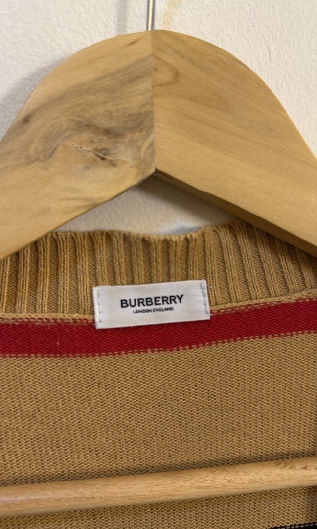 Burberry Striped Knit Cardigan (Category: Longsleeves) located in Paranaque City. Submitted by preluxeshop_ph (Listing ID 1465560842, Image 3). Description: Burberry Striped Knit Cardigan - Iconic stripe pattern - V-neck design - Button-up front - Two front pockets - Material: Cashmere, Polyester, Nylon blend - Ideal for layering 🔥CHECK OUT MY PROFILE FOR 100+ OTHER HIGH-END CURATED STREETWEAR, COATS AND VINTAGE DROPS!.