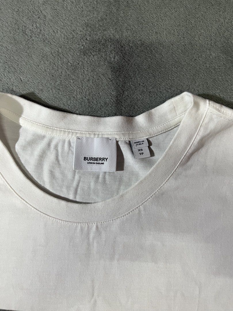 Burberry Tank top (Category: Activewear) located in Marilao. Submitted by thriftyy_69 (Listing ID 1465431235, Image 3). Description: Dimes: 22x27 Condition: 9.5/10 Issue: none.