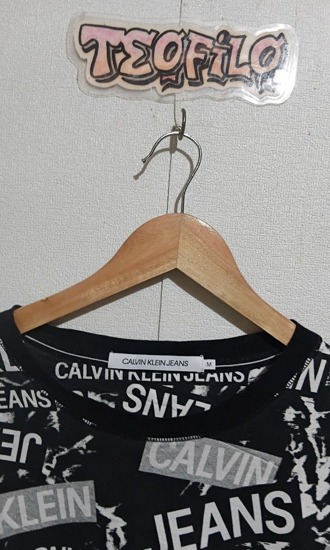 Calvin klein (Category: Tshirts & Polo Shirts ) located in Santo Tomas. Submitted by teofilo-thrifted (Listing ID 1465428495, Image 3). Description: Ck Aop Excellent Size medium on tag L26 W21.