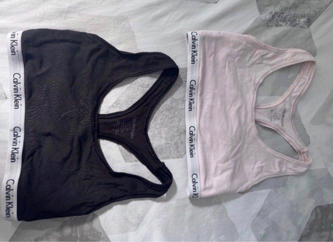 Calvin Klein Bralettes Set Black and Pink (Category: Undergarments & Loungewear) located in Manila. Submitted by decluterthings888 (Listing ID 1465397013, Image 1). Description: - Brand: Calvin Klein - Set includes: 2 racerback bralettes (1 Black, 1 Soft Pink) - Features: Iconic logo elastic underbust band - Material: Comfortable cotton blend - Origin: Made in Sri Lanka - Condition: Brand new / Excellent - Perfect for: Everyday wear, lounging, or