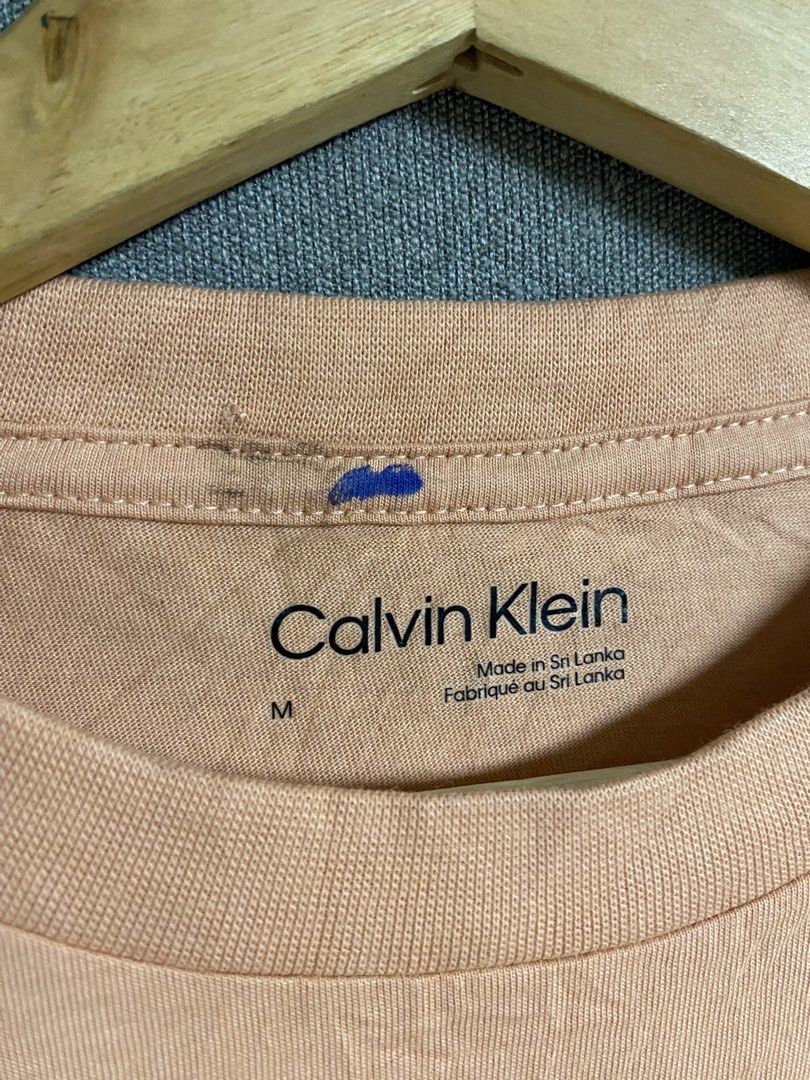 Calvin Klein Shirt (Category: Shirts) located in Cabuyao City. Submitted by ukaythriftshirt (Listing ID 1465526768, Image 3). Description: Calvin Klein Shirt Excellent condition Medium Dimes 20-24 Color rate 9/10 Issue may minimal pinhole sa likod mg neck check pics and need wash.