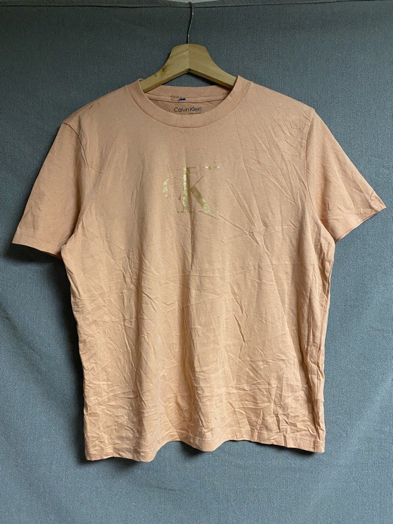 Calvin Klein Shirt (Category: Shirts) located in Cabuyao City. Submitted by ukaythriftshirt (Listing ID 1465526768, Image 1). Description: Calvin Klein Shirt Excellent condition Medium Dimes 20-24 Color rate 9/10 Issue may minimal pinhole sa likod mg neck check pics and need wash.