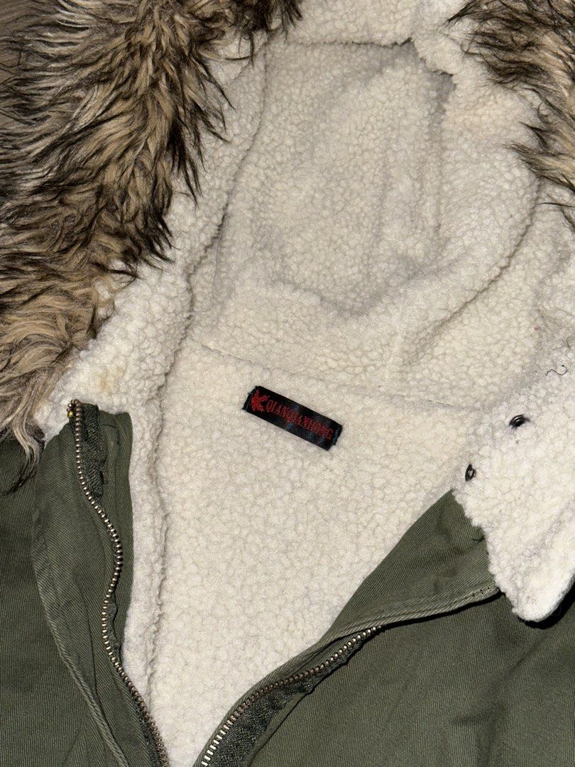 Camo green fur sherpa lining winter jacket (Category: Coats, Jackets and Outerwear) located in Manila. Submitted by brownbutterlatte (Listing ID 1465510670, Image 3). Description: Given as a gift. Never used. Just stored in the closet. Price is negotiable only for sure buyers. Super warm. Perfect for winter! Have fleece lining inside. Can fit XS- Small. Helping tags Zara Uniqlo Bershka Cotton On Mango Pull & Bear Stradivarius GU Cos H&M .