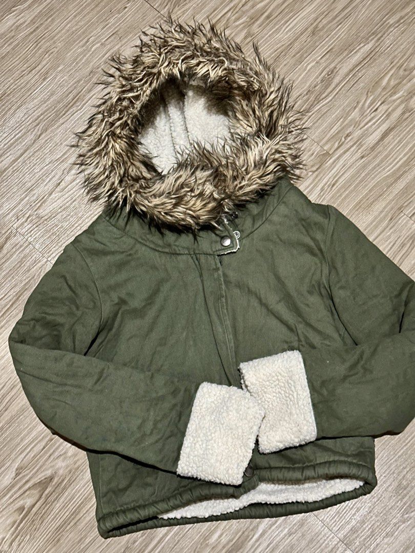Camo green fur sherpa lining winter jacket (Category: Coats, Jackets and Outerwear) located in Manila. Submitted by brownbutterlatte (Listing ID 1465510670, Image 1). Description: Given as a gift. Never used. Just stored in the closet. Price is negotiable only for sure buyers. Super warm. Perfect for winter! Have fleece lining inside. Can fit XS- Small. Helping tags Zara Uniqlo Bershka Cotton On Mango Pull & Bear Stradivarius GU Cos H&M .