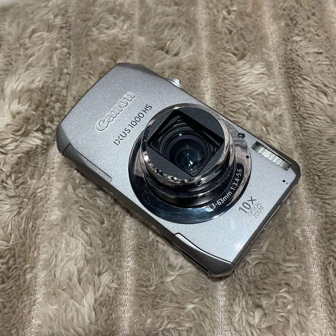 Canon IXUS 1000 HS Digital Camera DigiCam (Category: Cameras) located in Quezon City. Submitted by my_cabinet (Listing ID 1465521589, Image 1). Description: First to pay basis! ♡ READ T&C on bio first before offering! • Flash - Working! • All buttons working • Body condition: See pics Inclusions: • Battery ✉️: No lens curtain and slight vignette only! Sample shots/video will be sent thru IG/IMS/DRIVE 📍Quezon City 🚗 J&T / Same Day Delivery / LBC