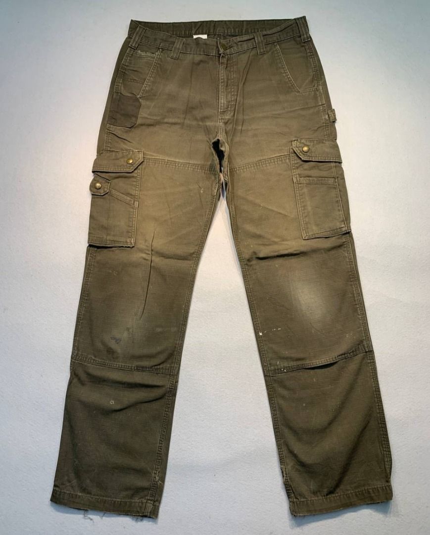 Carhartt B342 DFE Cargo Relaxed Fit Pants (Category: Jeans) located in Mandaluyong City. Submitted by theroom501 (Listing ID 1465417667, Image 2). Description: Carhartt B342 DFE Cargo Relaxed Fit Pants Style Code: B342 DFE Size on Tag: 34 Color: Cream Condition: Good pre-owned condition with a heavily distressed vintage look. Flaws/Issues: Heavy distressing throughout the fabric faded paint stain. Flat Lay Measurements: Pit to Pit: 34 inches Leng