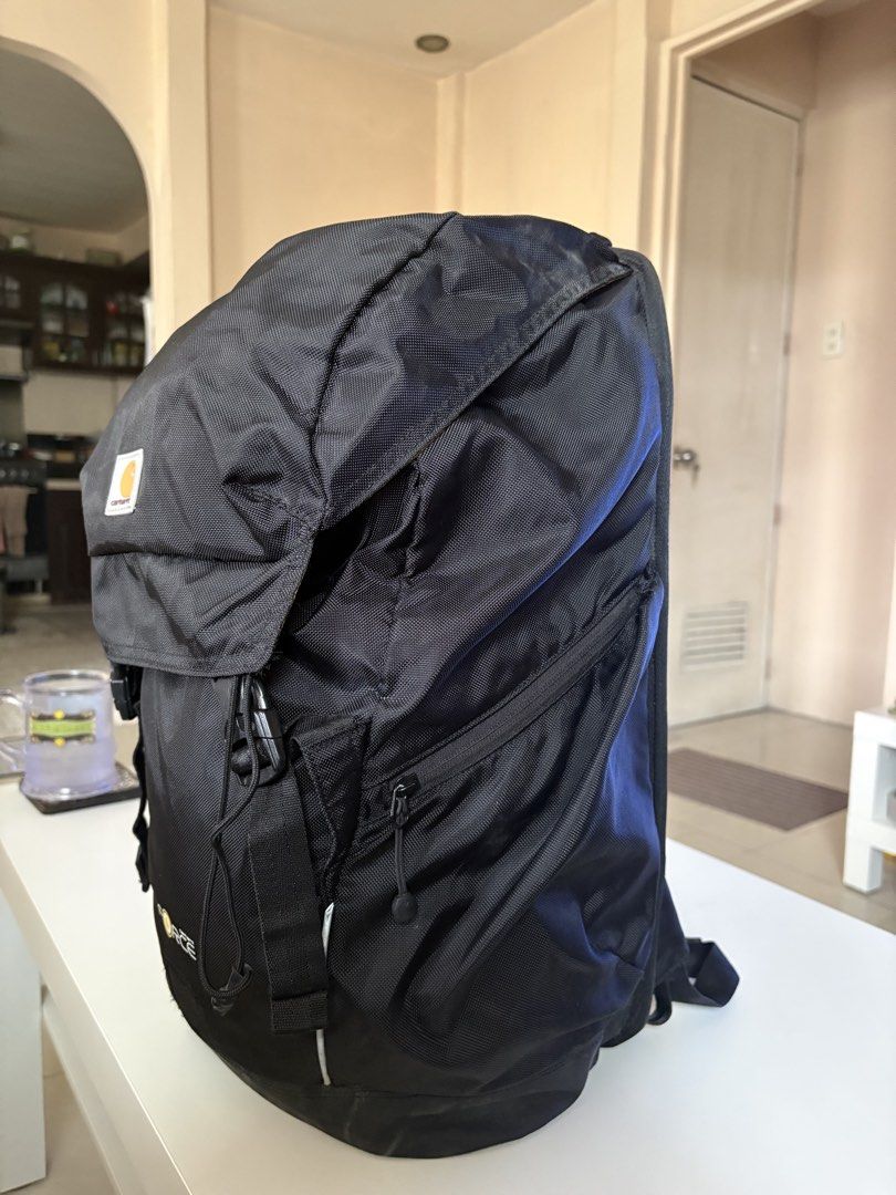Carhartt Force Black Backpack (Category: Backpacks) located in Manila. Submitted by kakiboyo (Listing ID 1465392701, Image 2). Description: - Authentic Black Carhartt Force backpack in clean condition - Sturdy and durable build designed for daily use, travel, or light hiking - Adjustable straps and secure front buckle closures - Breathable mesh back panel for all-day comfort - Side zippered pockets to keep your small essentials secure.