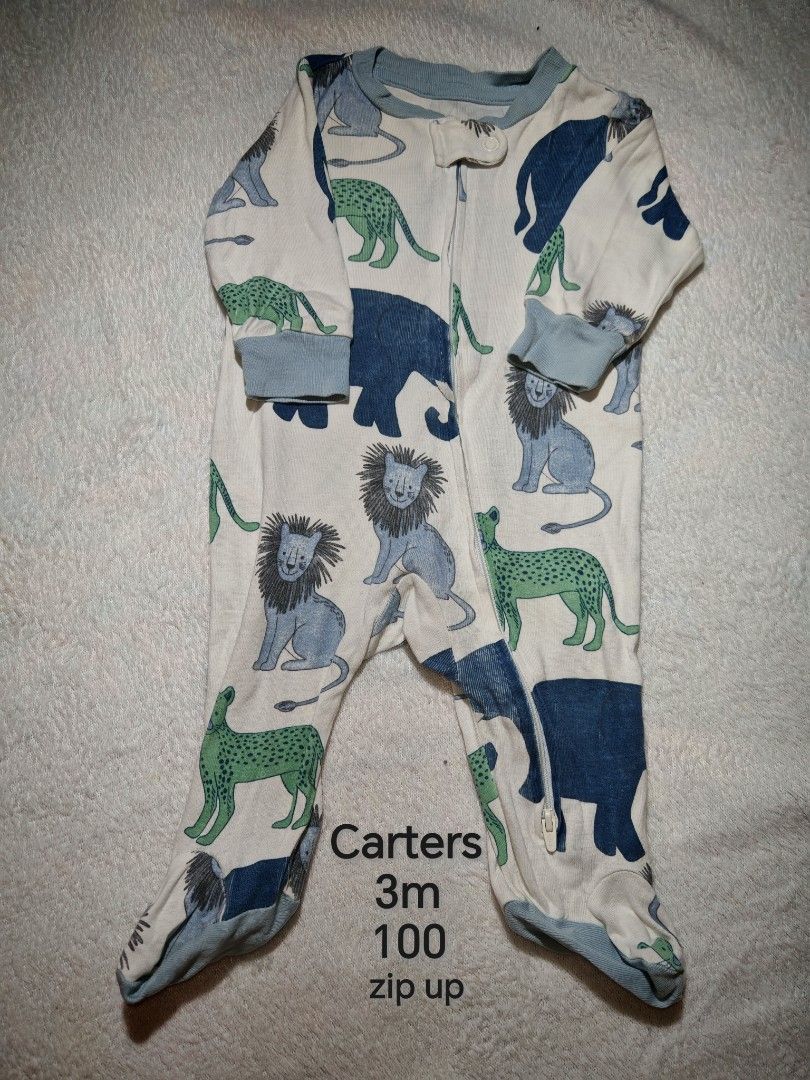 Carters 3m (Category: Babies & Kids Fashion) located in Quezon City. Submitted by maypamor (Listing ID 1465484342, Image 1). Description: - Brand: Carter's - Size: 3 Months - Design: Adorable blue and green lion, cheetah, and elephant print on off-white - Material: Soft and breathable cotton - Features: Full-length front zipper for quick diaper changes, built-in footies to keep toes warm, and comfy ribbed cuffs Preloved Clothes not from Ukay Loca