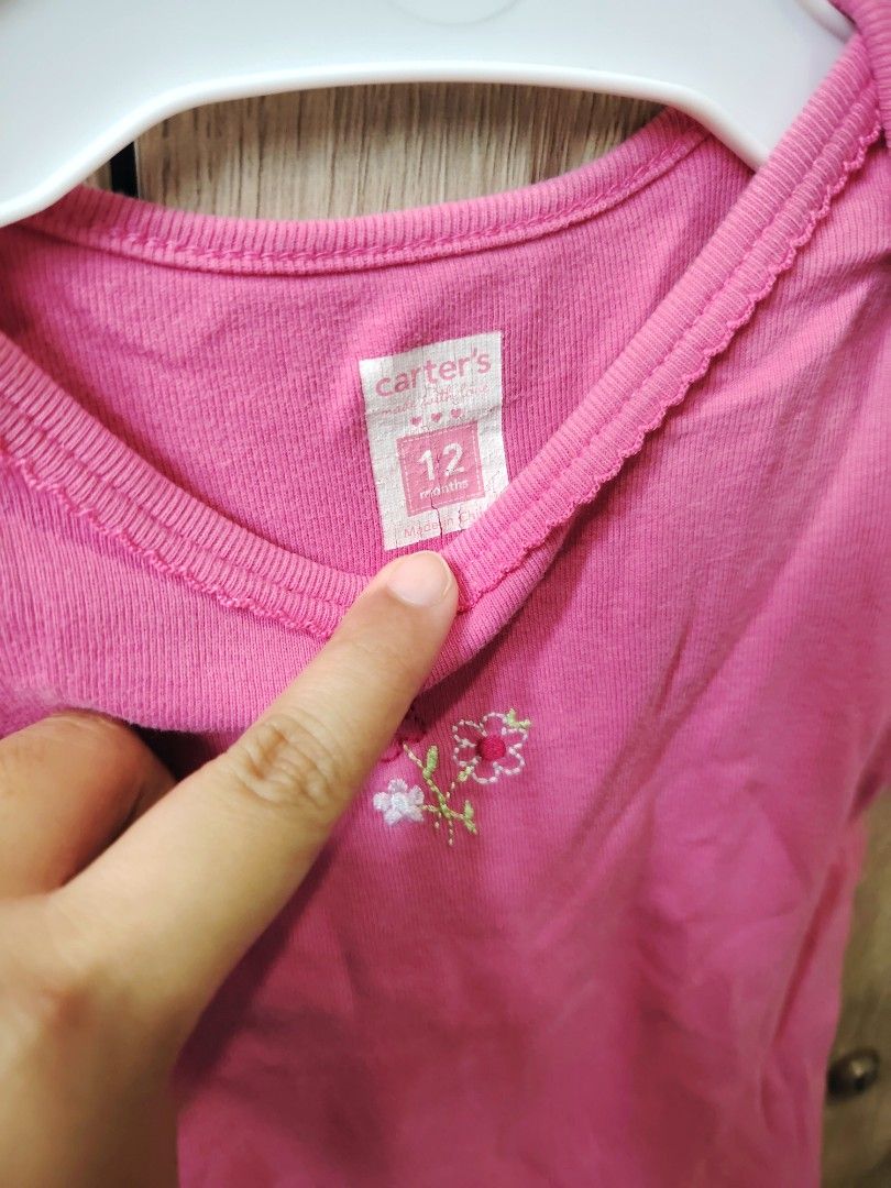 Carter's Baby Bodysuits Bundle 9-12 Months (Category: Babies & Kids Fashion) located in Malabon City. Submitted by jessa.sioson (Listing ID 1465528729, Image 2). Description: - Brand: Carter's - Quantity: Bundle of 3 baby bodysuits - Size: 9 to 12 months - Material: Super soft cotton - Features: Bottom snap button closures for quick and easy diaper changes - Designs included: * Plain pink short-sleeve with cute floral embroidery * Black and white