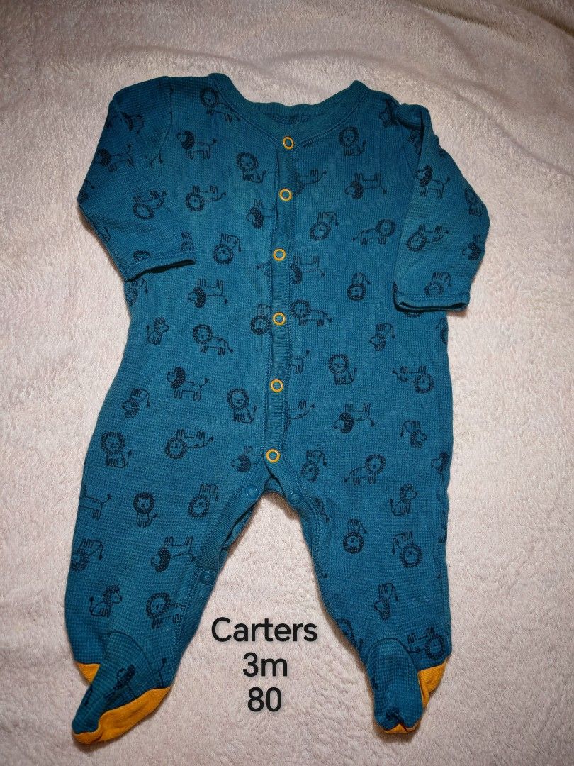 Carters Frogsuit Sleepwear 3m (Category: Babies & Kids Fashion) located in Quezon City. Submitted by maypamor (Listing ID 1465483178, Image 1). Description: - Brand: Carter's - Size: 3 Months (Height 80) - Design: Playful all-over lion print in a stylish teal color - Material: Cozy ribbed waffle knit fabric for extra warmth - Features: Long sleeves, enclosed feet with yellow toe details, and functional orange snaps for easy diaper changes and dre