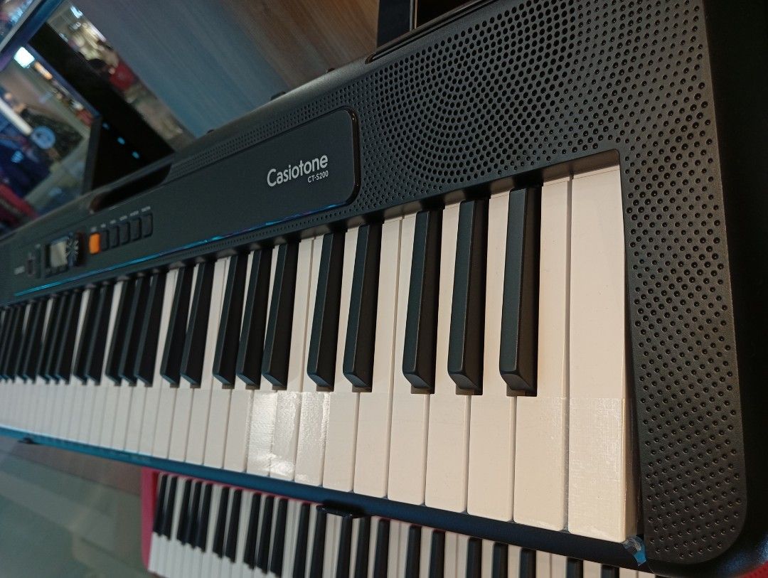 Casio Casiotone CT-S200 Portable Keyboard (Category: Musical Instruments) located in Manila. Submitted by fabianpaolo93 (Listing ID 1465463050, Image 2). Description: - Model: Casio Casiotone CT-S200 - Standard-size keys with easy-to-read LCD screen - Lightweight design featuring a built-in grab handle - Built-in speakers and music rest slot - Features fun Dance Music Mode - Ideal for beginners, practice, and portable playing.