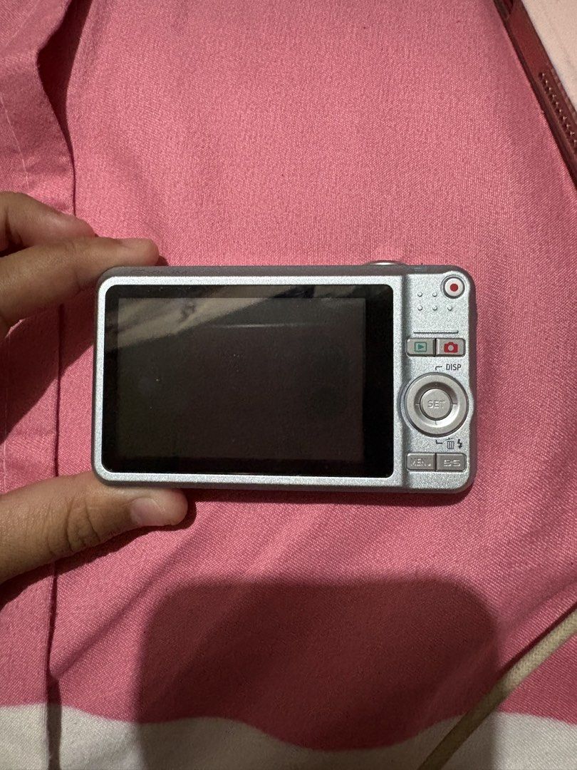 Casio Exilim EX-Z80 Digital Camera (Category: Cameras) located in Manila. Submitted by strawberrymatcha2223 (Listing ID 1465531455, Image 3). Description: - Model: Casio Exilim Digital Camera - Resolution: 8.1 Megapixels - Color: Silver finish, compact body - Condition: Tested and fully working (screen, optical zoom, buttons, and rear dial all functional; normal signs of handling) - Perfect for: Y2K and retro aesthetic photography.