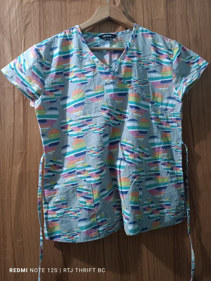 Cassandra O Scrub Top Only (XS on Tag) (Category: Others Tops) located in Baguio. Submitted by ogiesiomai23 (Listing ID 1465484611, Image 2). Description: Details and Measurements on the first photo. Excellent Used Condition, Like New to Good as New Last Price: P150 + SF.