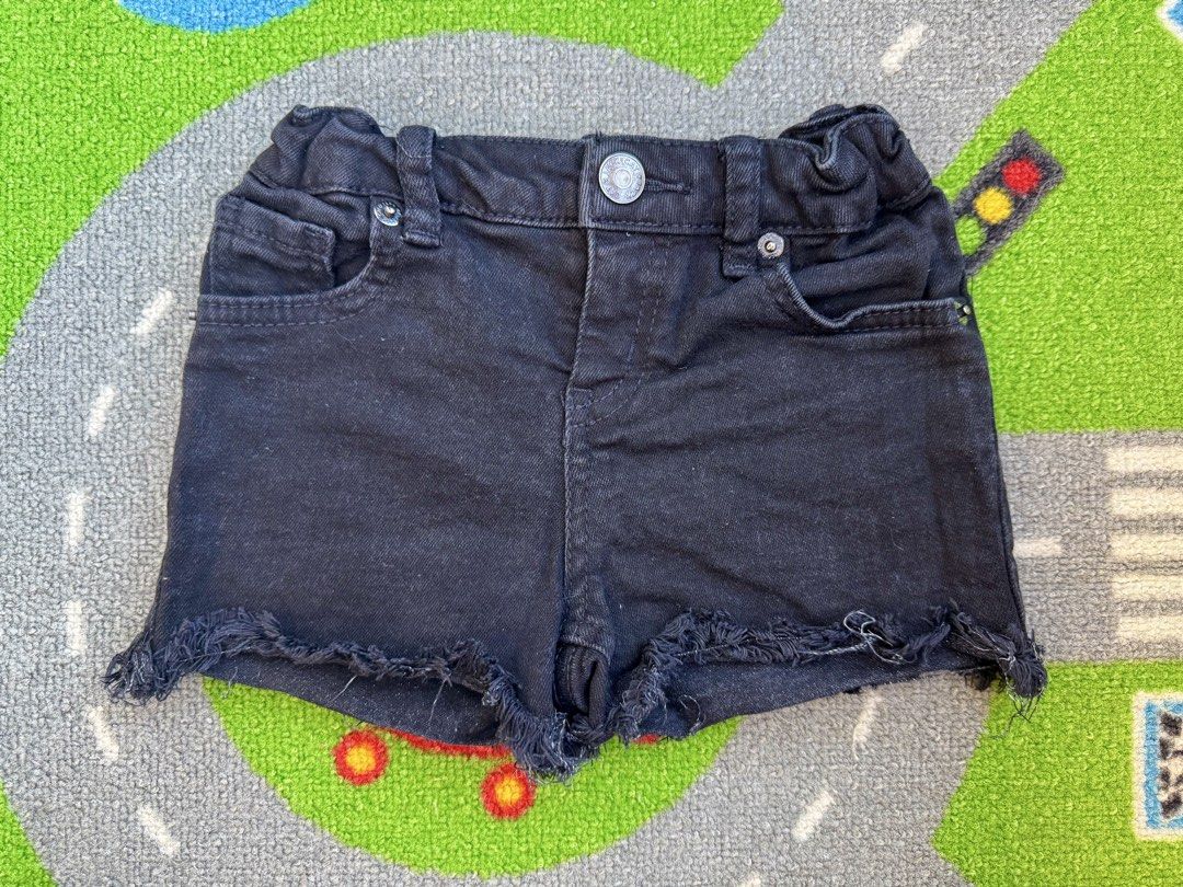 Cat & Jack Black Denim Distressed Raw Hem Shorts (Category: Babies & Kids Fashion) located in Rizal. Submitted by preloovved (Listing ID 1465485314, Image 1). Description: Super comfy black denim shorts featuring a cool distressed raw hem and stretchy back waistband. Perfect dark wash basic for your everyday sunny weather OOTDs! Black denim shorts with frayed edges. Features button closure, two front pockets, and elastic waistband. Great for ever